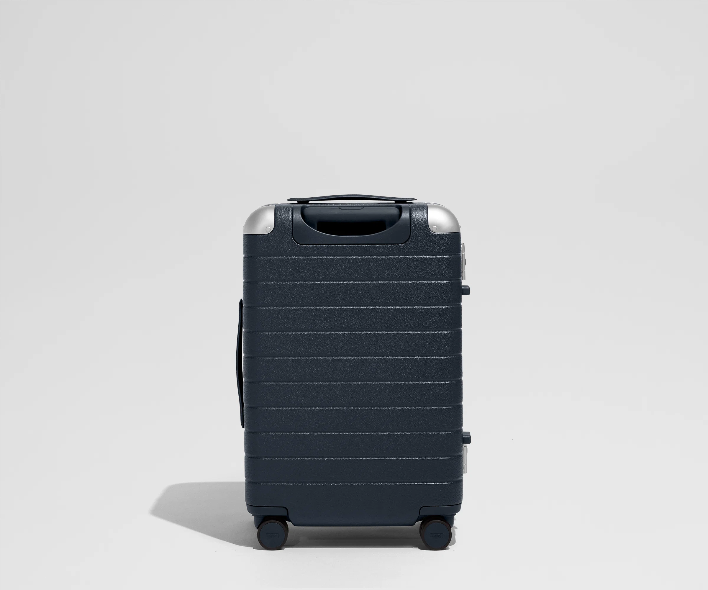 The Aluminum Edge Bigger Carry-On in Navy Blue - Image 6