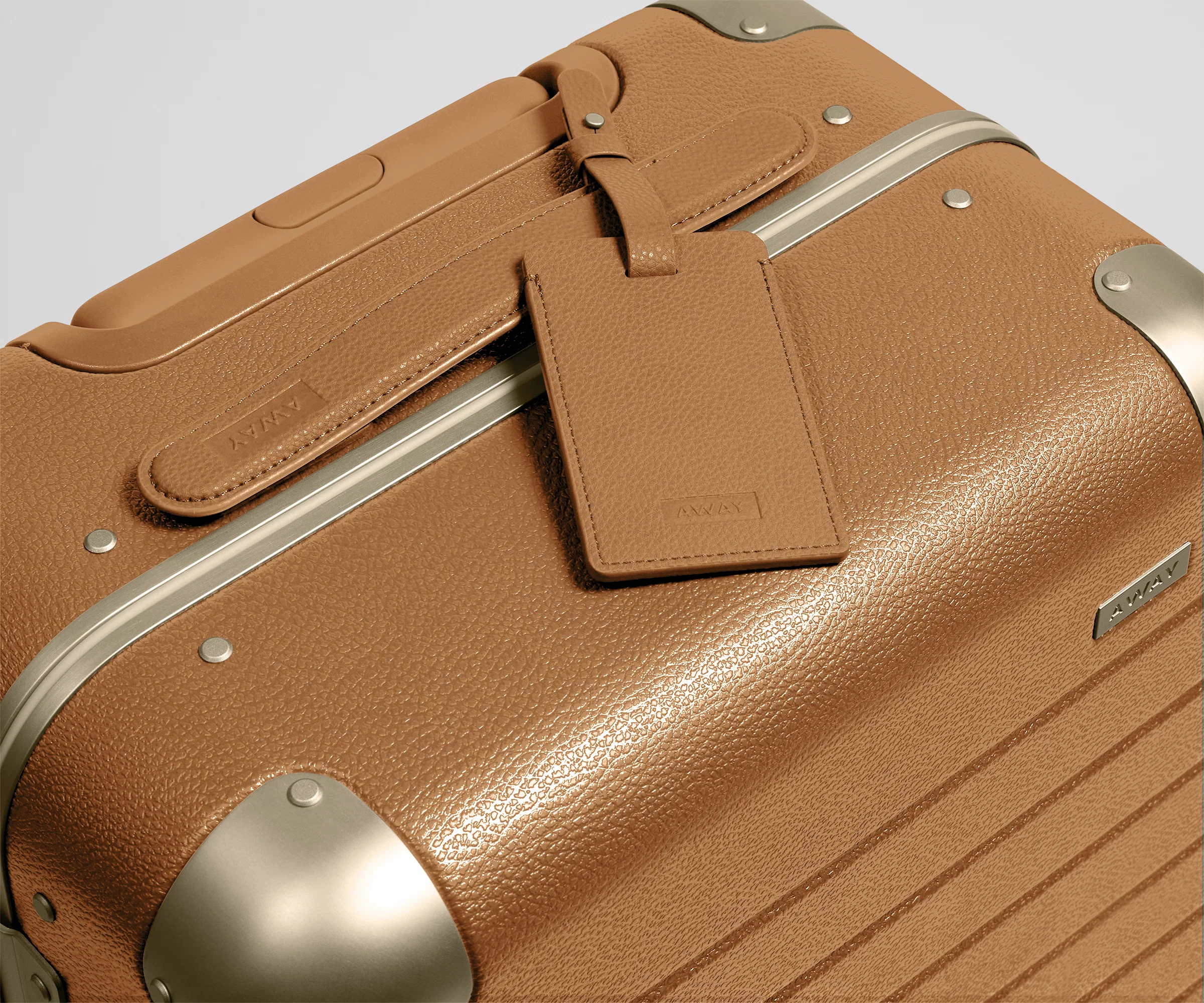 The Aluminum Edge Bigger Carry-On in Cognac Brown - Image 8